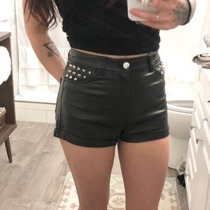 Divided studded faux leather shorts